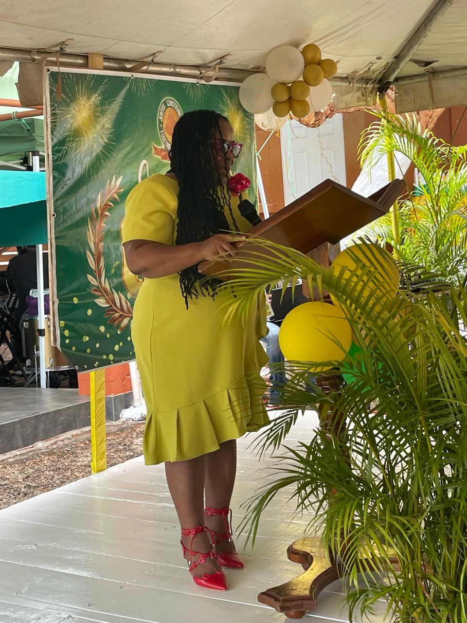 Dr. Kereen Tatham-Brown speaking at an event
